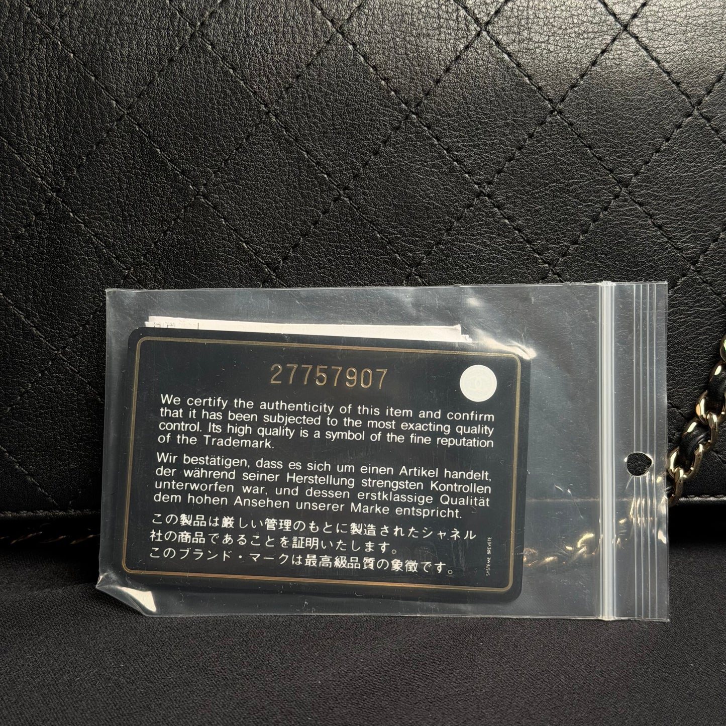 Chanel CC Turn-Lock Wallet on Chain (WOC) in Black Quilted Lambskin Leather